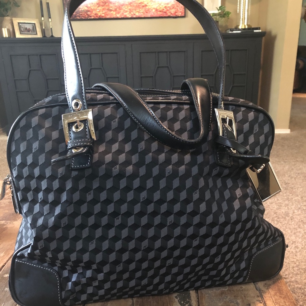 Chic carryon or weekender bag.